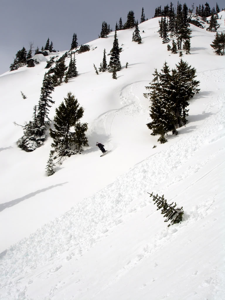 Putting in some great snowboard turns on Pickhandle Peak in the Crystal Mountain Backcountry