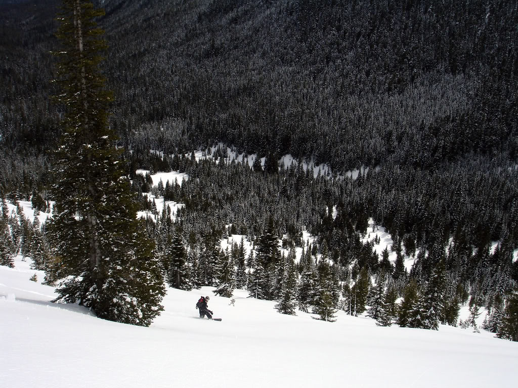 Enjoying turns all the way into Morse Creek basin below in the Crystal Mountain Backcountry