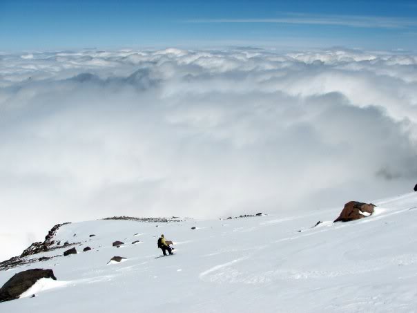 Snowboarding off the summit of Mount Ruth