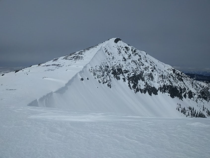 Looking at the summit of Skyscraper peak in winter in Mount Rainier National Park