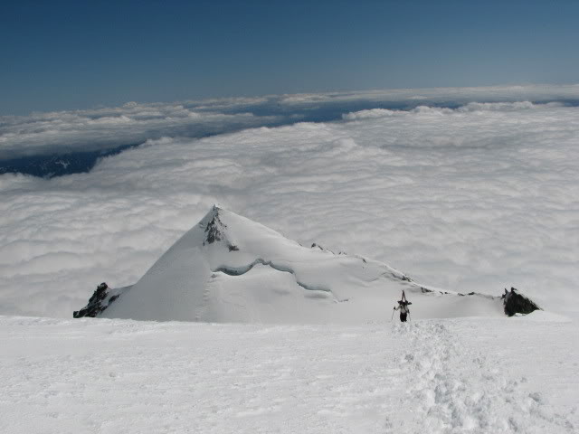 Taking the last steps to the summit of Mount Baker