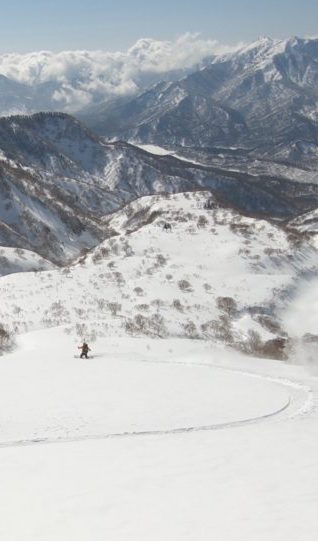 Snowboarding down Hiuchi near Myoko Kogen in Japan