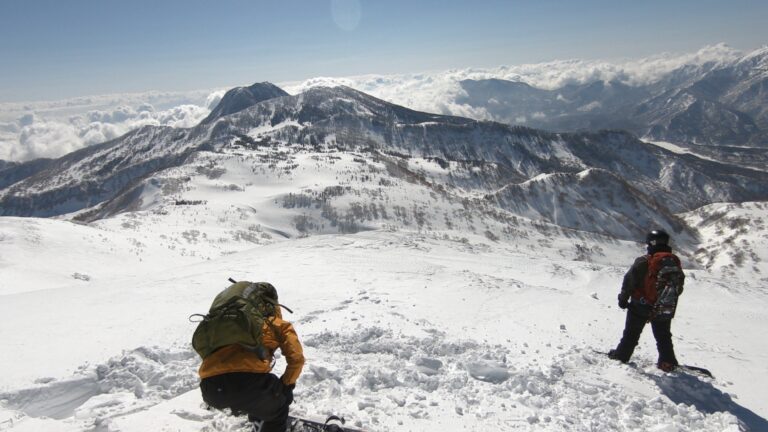 Preparing to snowboard down Hiuchi