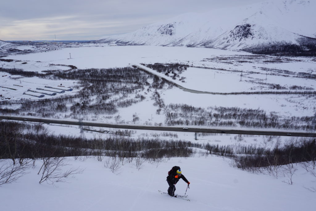 Ski touring with the Kirovsk area in the background