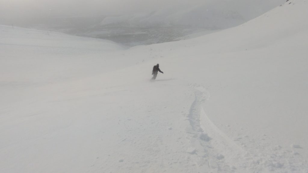 Snowboarding powder snow in the Bigwood Sidecountry