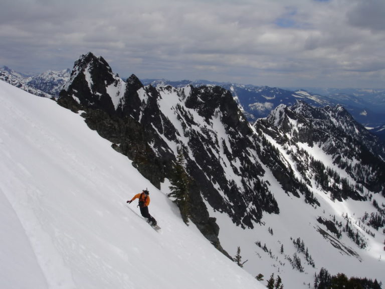 The first turns off the summit of Kaleetan Peak during the Alpental to Granite ski traverse