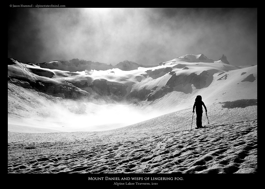 Heading up to Mount Daniel in the clearing fog during the Alpine Lakes Ski Traverse in Alpine Lakes Wilderness