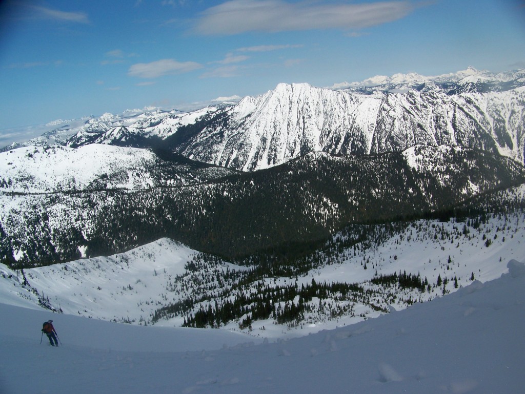 Ski touring up with the Stevens Pass Backcountry in the background