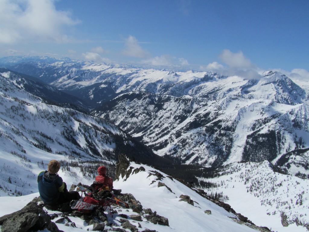 resting with a stunning view of Trinity and Leroy Basin from Seven Fingered Jack