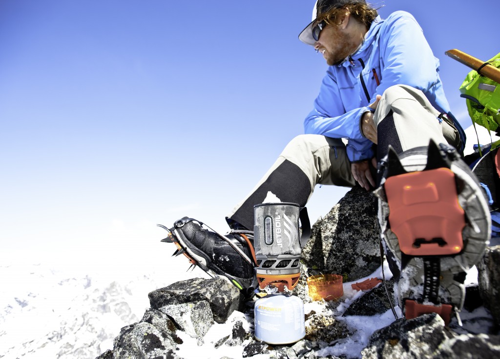 Stopping to melt water while climbing Seven Fingered Jack