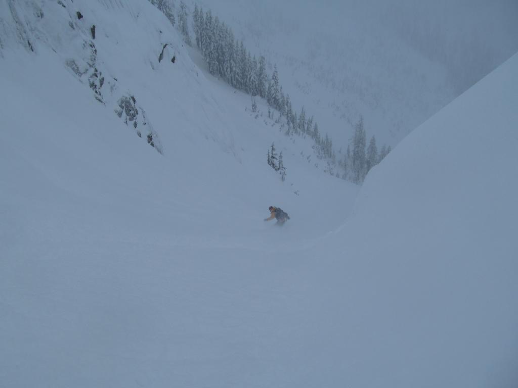 Riding the lower section of Bryant Peak Couloir