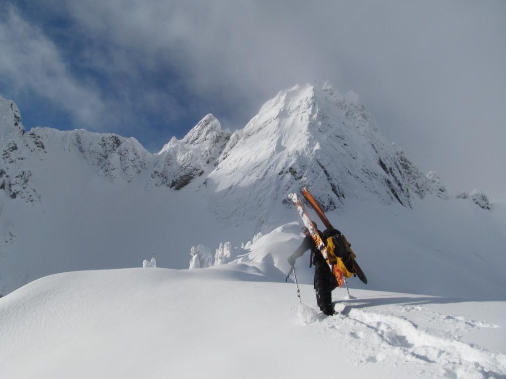 Ben Boot packing with Chair Peak in the Background