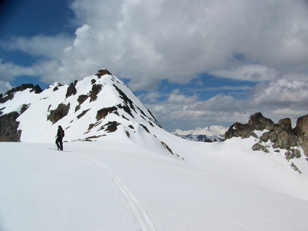 Skinning the East ridge with Cardinal Mountain in the distance