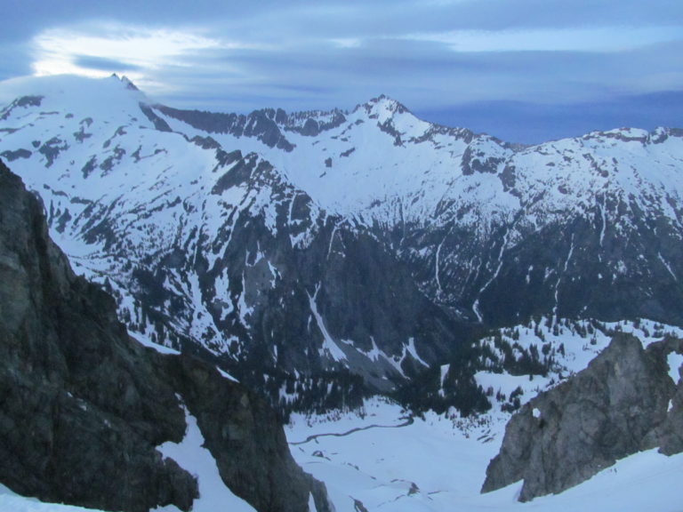 Looking towards Sahale Peak and Mount Buckner near Cache Col in North Cascades National Park and Cascade Pass on the Ptarmagin Traverse