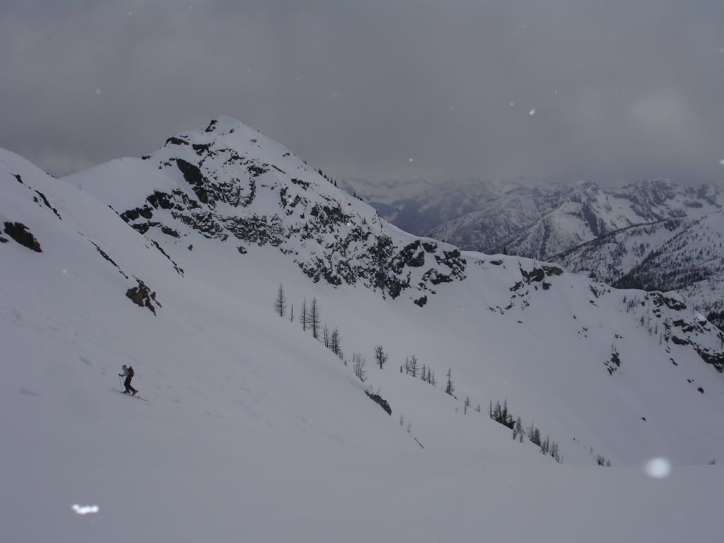 skinning back up to the East col with our ski line in the background