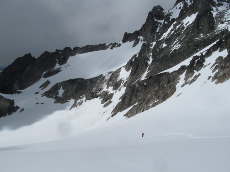 Snowboarding down from Snowfield Col