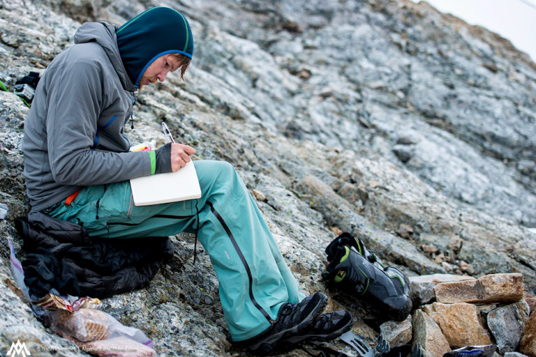 writing in a diary at our first campsite