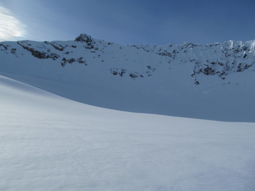 Skinning up the glacier towards the Nohokomeen Headwall of Jack Mountain