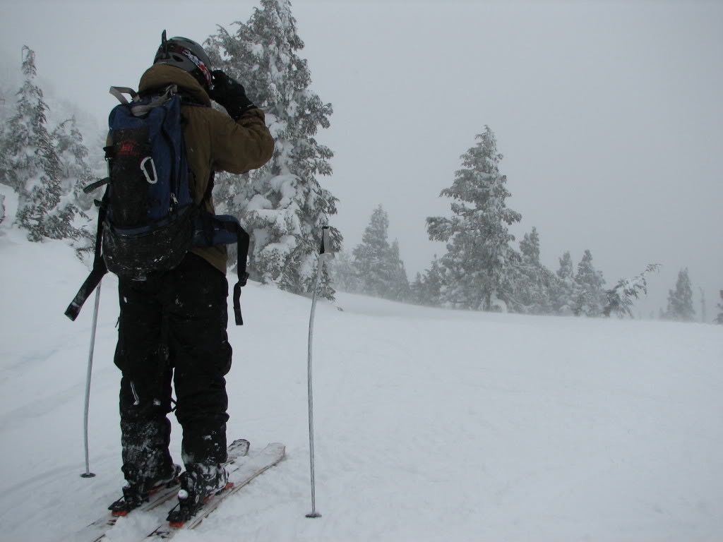 Preparing to ski back down the groomer