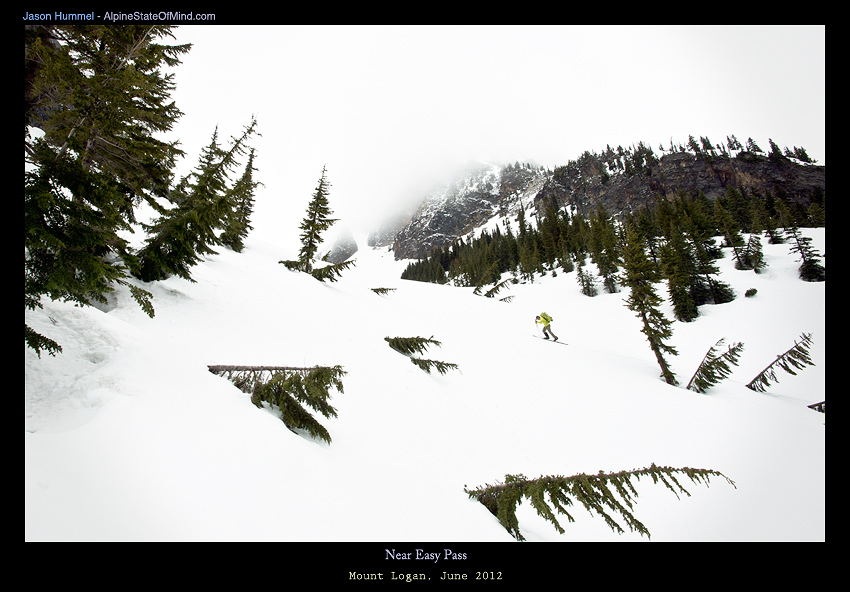 Ski touring into the clouds towards Easy Pass