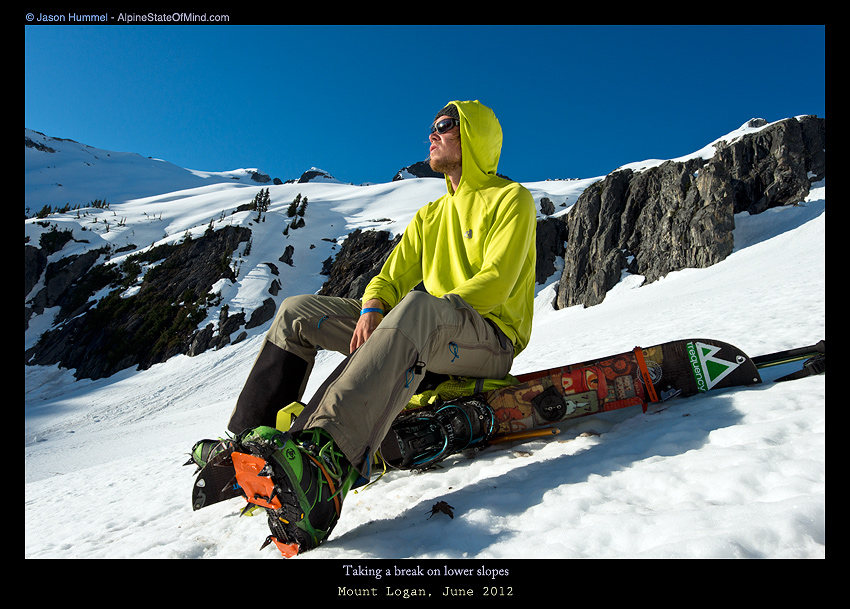 taking a break and enjoying the sun before climbing Mount Logan via the Douglas Glacier