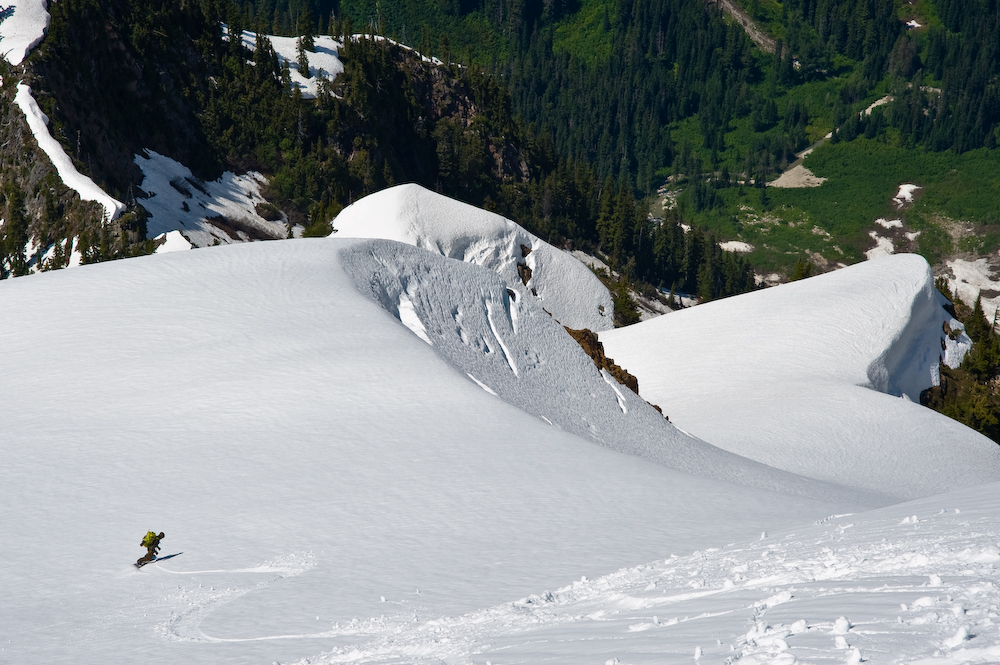 Snowboaring into the Mcmillan Cirque