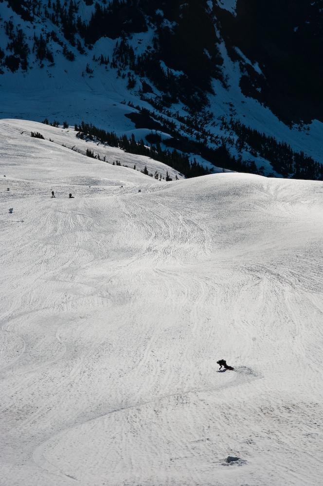 Early morning snowboard turns on the South face of Luna Peak