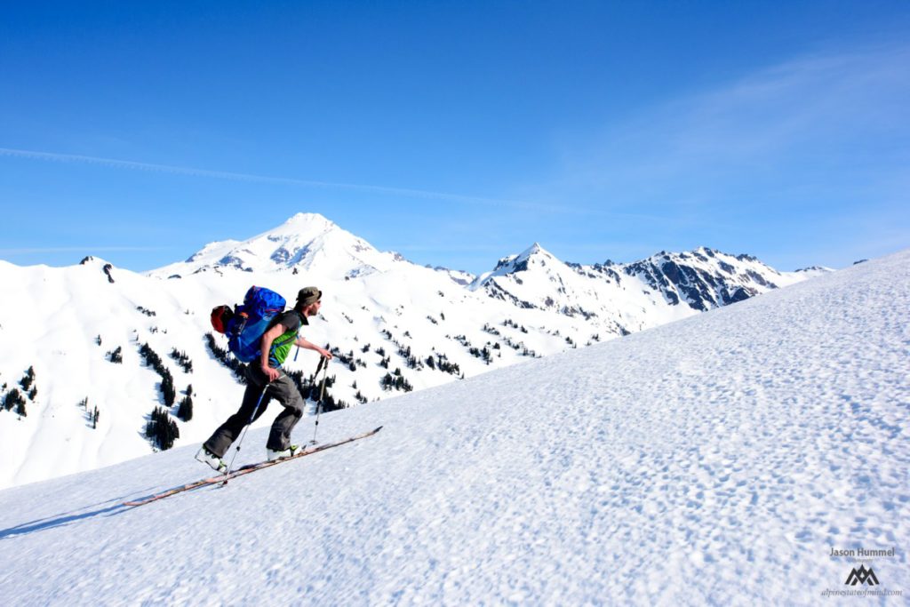 Ben skinning with Glacier Peak in the distance on our trip from Sauk River to Highway 2