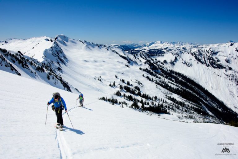 skinning up Whittier Mountain with Longfellow in the distance on our trip from Sauk River to Highway 2