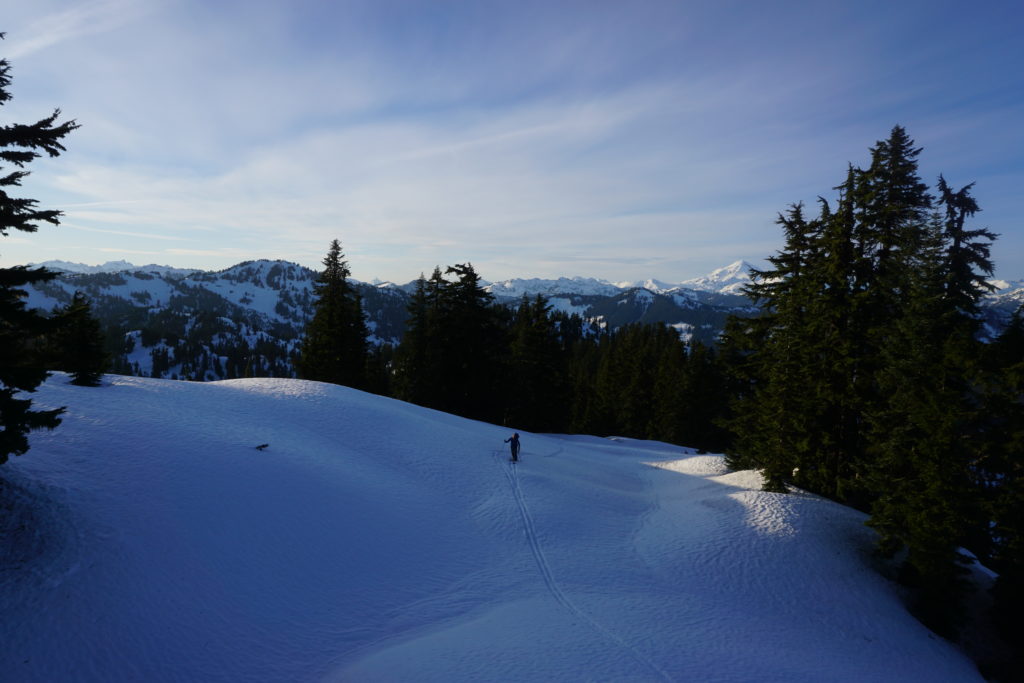 Breaking trail with Glacier Peak in the background