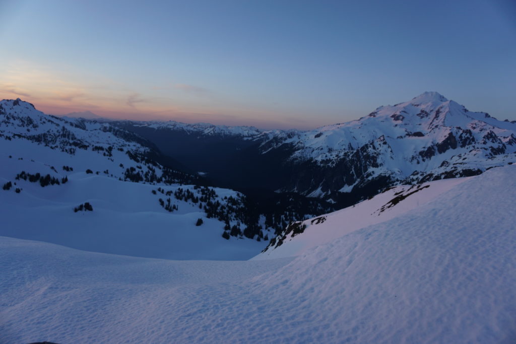 Dusk on White Peak with Glacier Peak in the distance on our trip from Sauk River to Highway 2