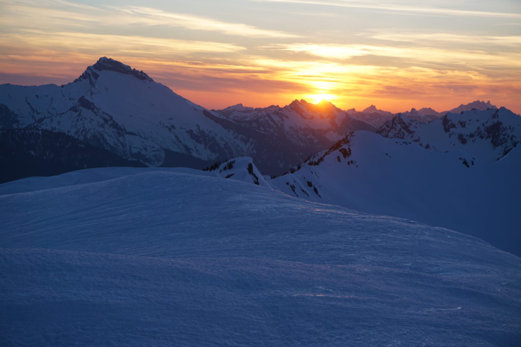 Stunning sunset over Sloan and the Monte Cristos on our trip from Sauk River to Highway 2