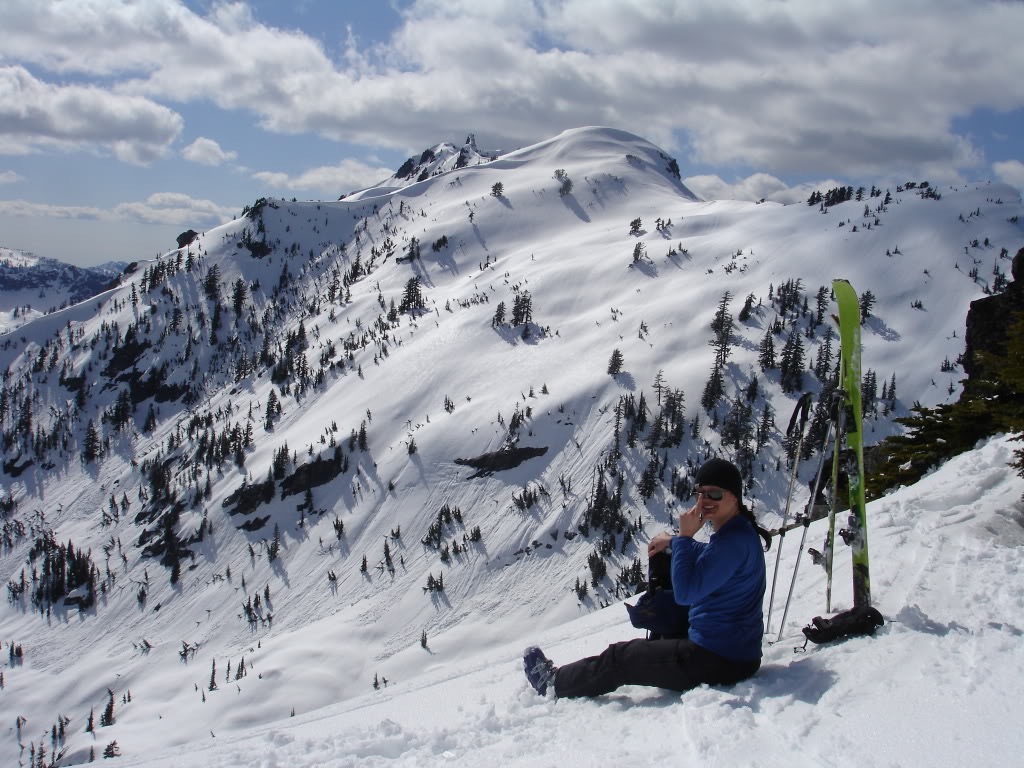 Christy resting on Lundin Peak with Commonwealth Basin in the background
