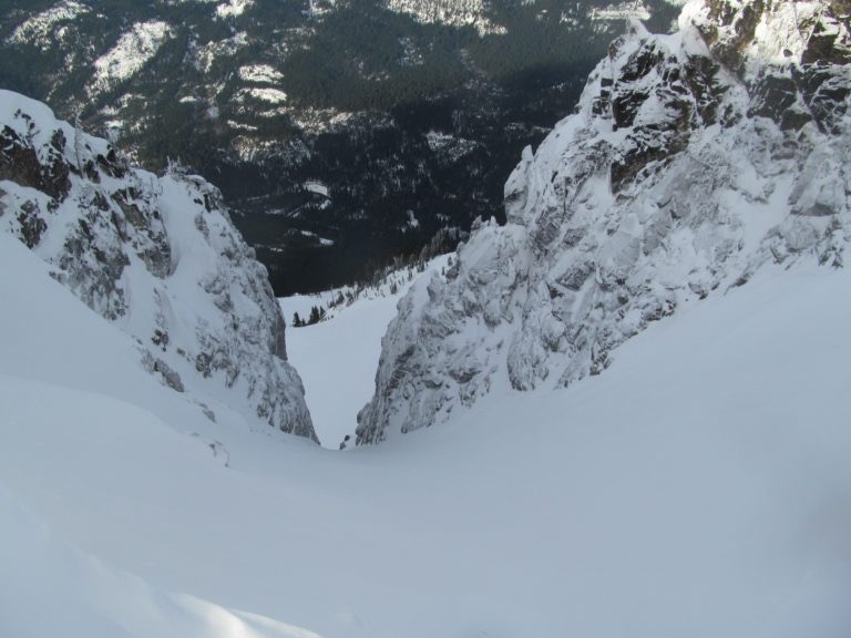 Passing a nice North facing chute on the Rock, Howard Mastiff Traverse