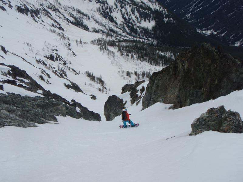 Snowboarding down the south chute of Seven Fingered Jack