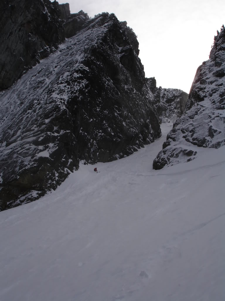 Skiing through the choke of the Slot Couloir on Snoqualmie Mountain