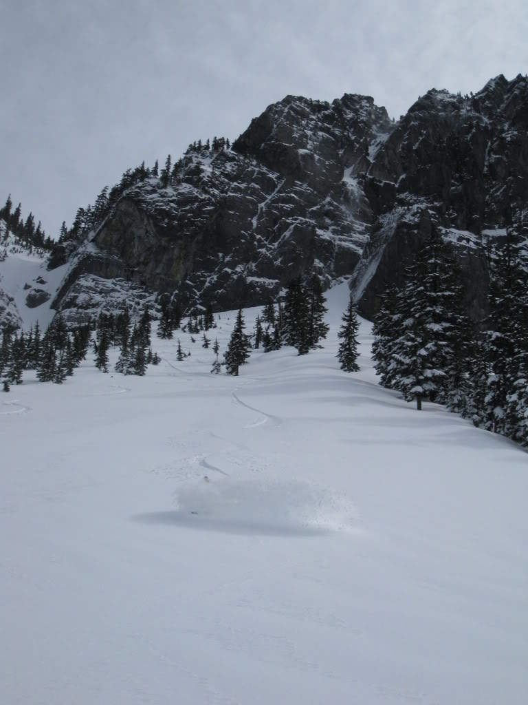 Snowboarding the apron of the Slot Couloir