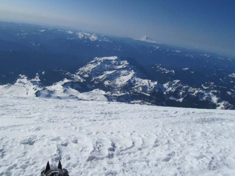 Looking down onto the Tatoosh Range from the summit of Mount Rainier before riding the Fuhrer Finger