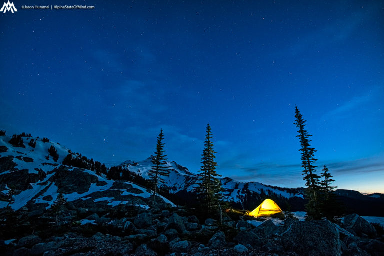 Camping with Glacier Peak in the background at the end of the Dakobed Range during the Suiattle Traverse