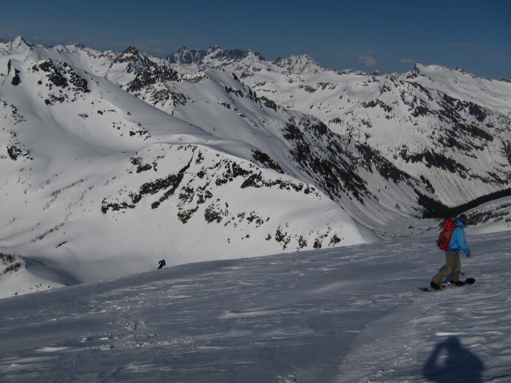 Snowboarding down Tenpeak Mountain with the Napeequa Valley underneath