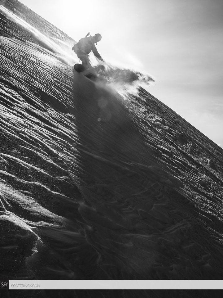 Ben making snowboard turns down Tenpeak Mountain