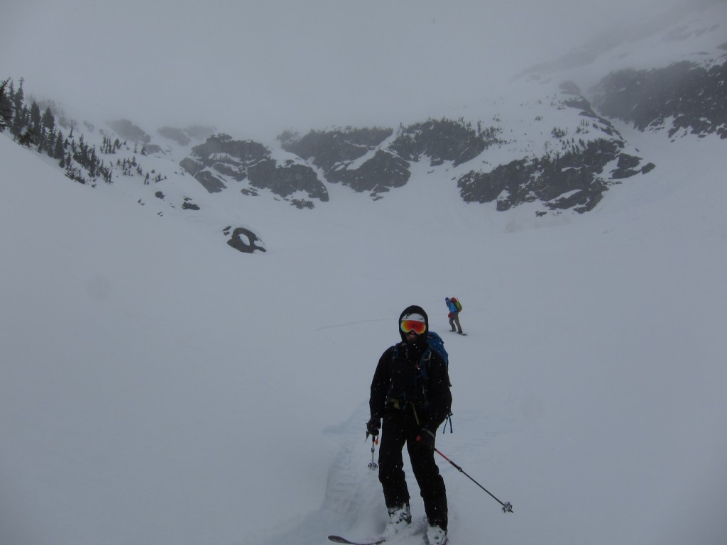 Skiing down Thunderbasin getting below the clouds of Tenpeak Mountain