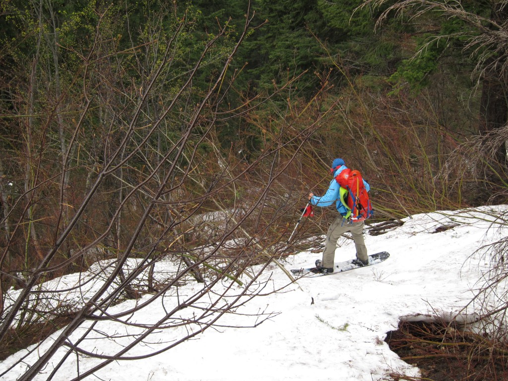 Snowboarding into the White River Valley after riding Tenpeak Mountain