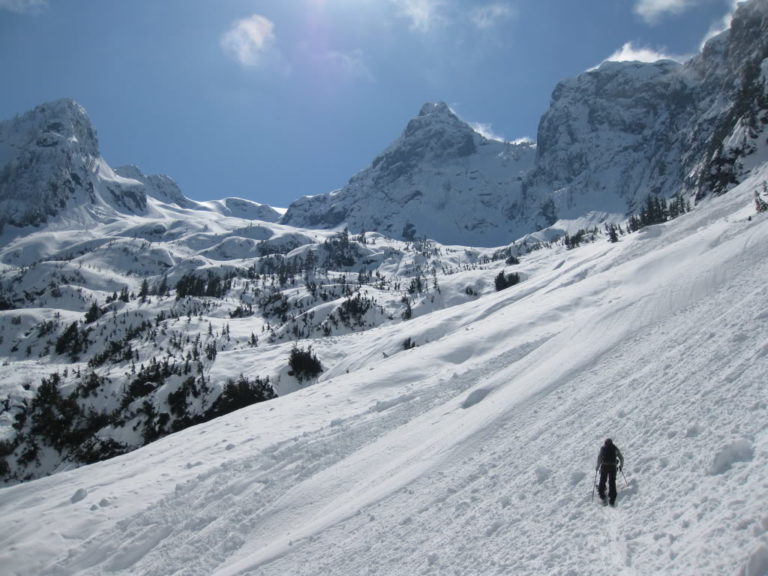 Ski touring up towards the alpine on Whitehorse Mountain