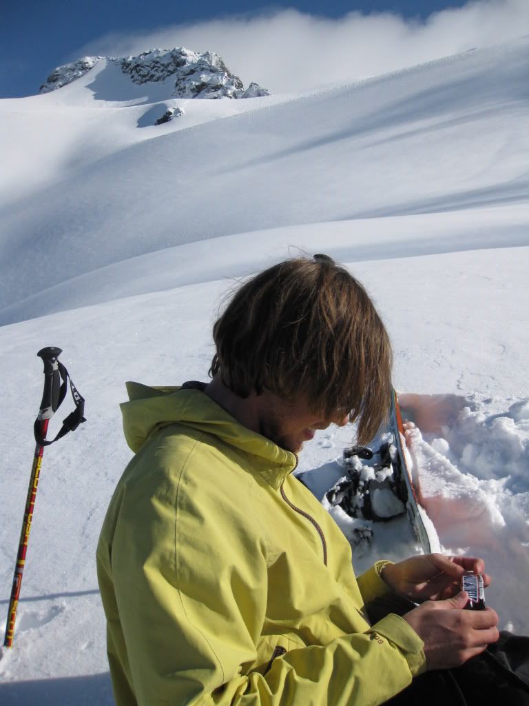 Enjoying some food with the summit proper in the distance