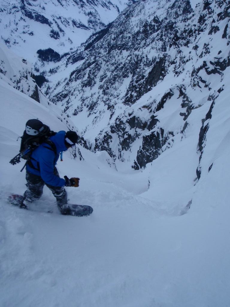 Snowboarding down the Black Hole Couloir on Bandit Peak Couloir