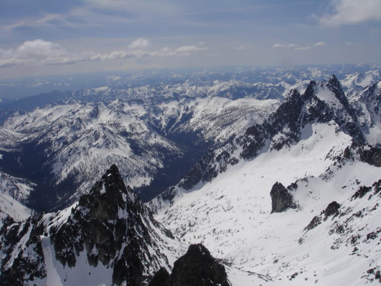 Mt Rainier showing herself in the distance from Dragontail Peak