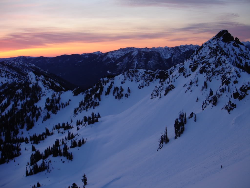Skinning up Silver Basin in the Crystal Mountain Southback at Sunrise Before riding the Sheep Lake Chute