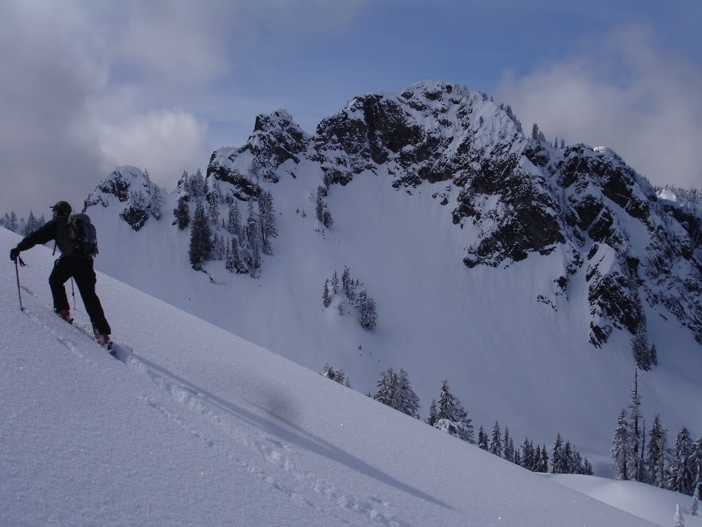 Ski touring up Wahpenayo Peak with Eagle Peak in the background