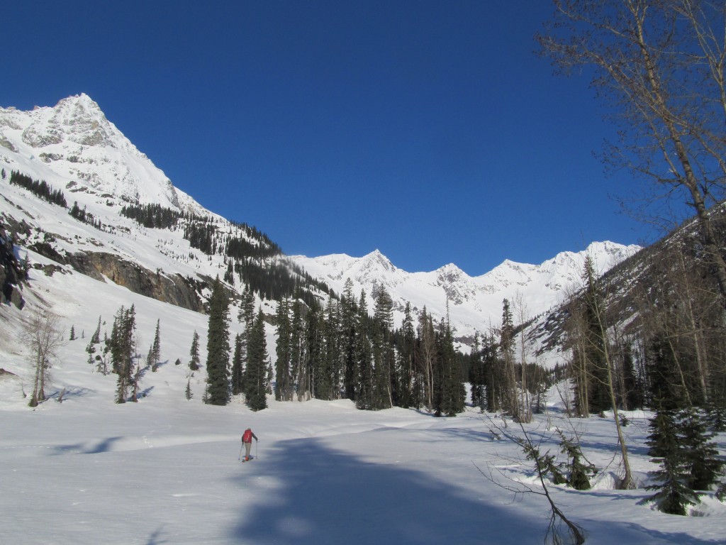 Skinning up North Fork of Bridge Creek with The Logan Massif at the head of the valley
